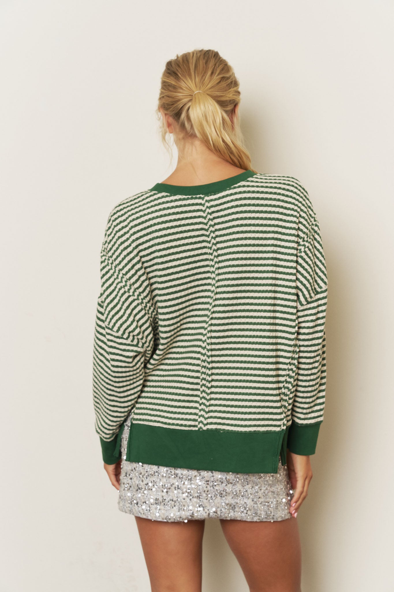 STRIPE EXPOSED SEAM SPLIT HEM LONG SLEEVE KNIT TOP (PRE-ORDER)