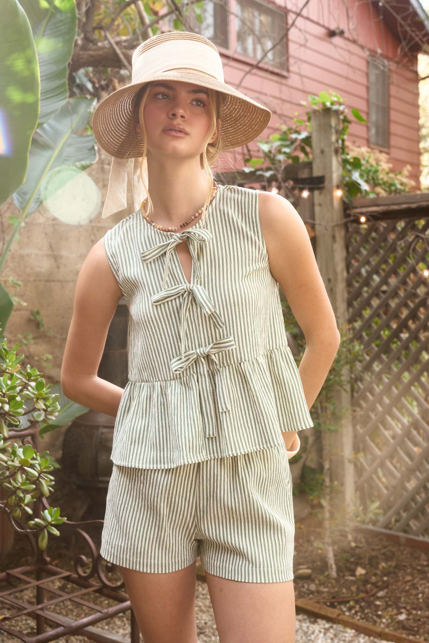 STRIPE FRONT TIE SLEEVELESS RUFFLE HEM TOP (PRE-ORDER)