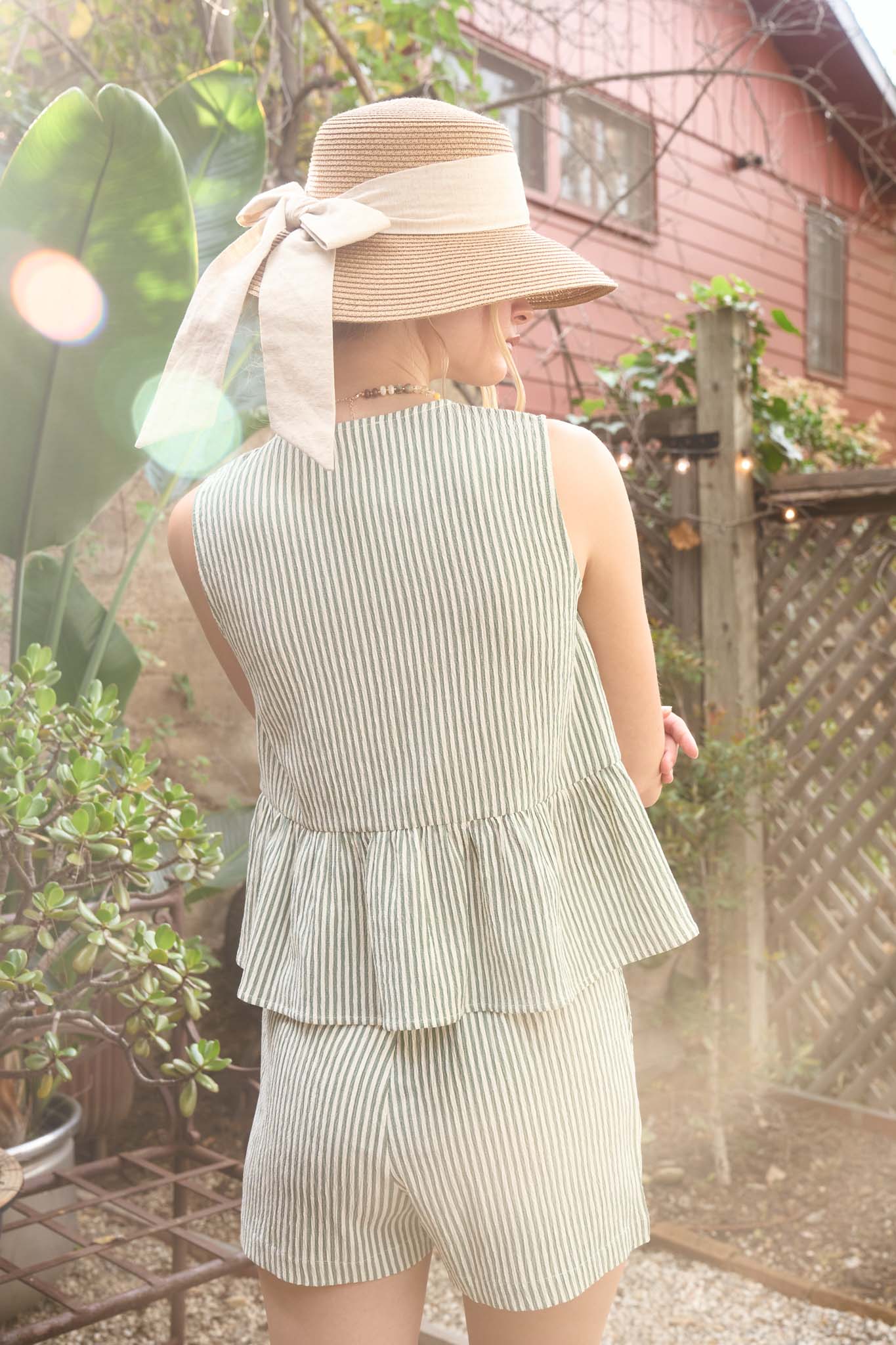 STRIPE FRONT TIE SLEEVELESS RUFFLE HEM TOP (PRE-ORDER)