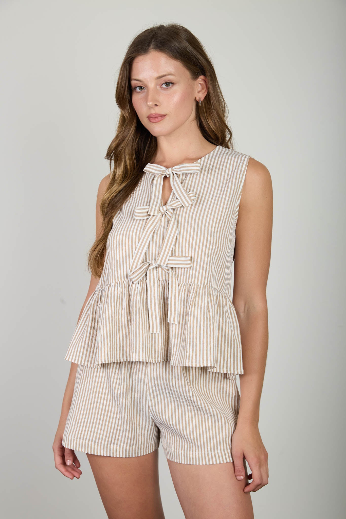STRIPE FRONT TIE SLEEVELESS RUFFLE HEM TOP (PRE-ORDER)
