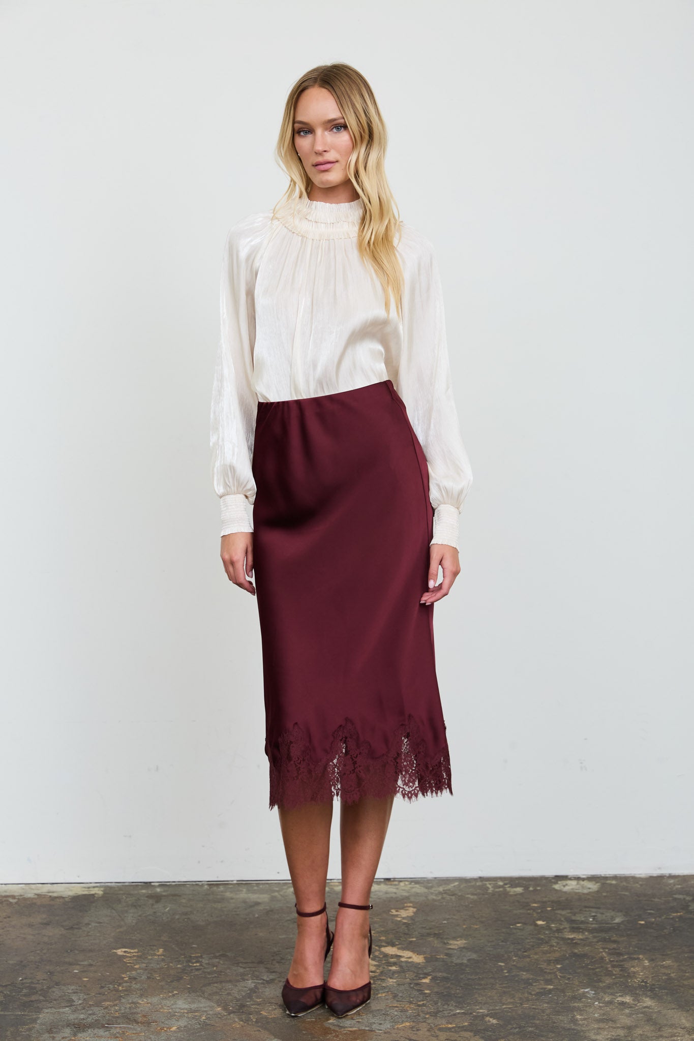 SMOCKED NECK SHIMMER LONG SLEEVE BLOUSE