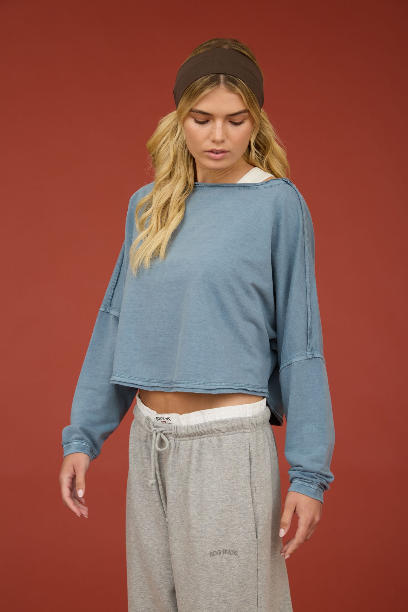 BOAT NECK RAW EDGE LONG SLEEVE CROPPED KNIT TOP