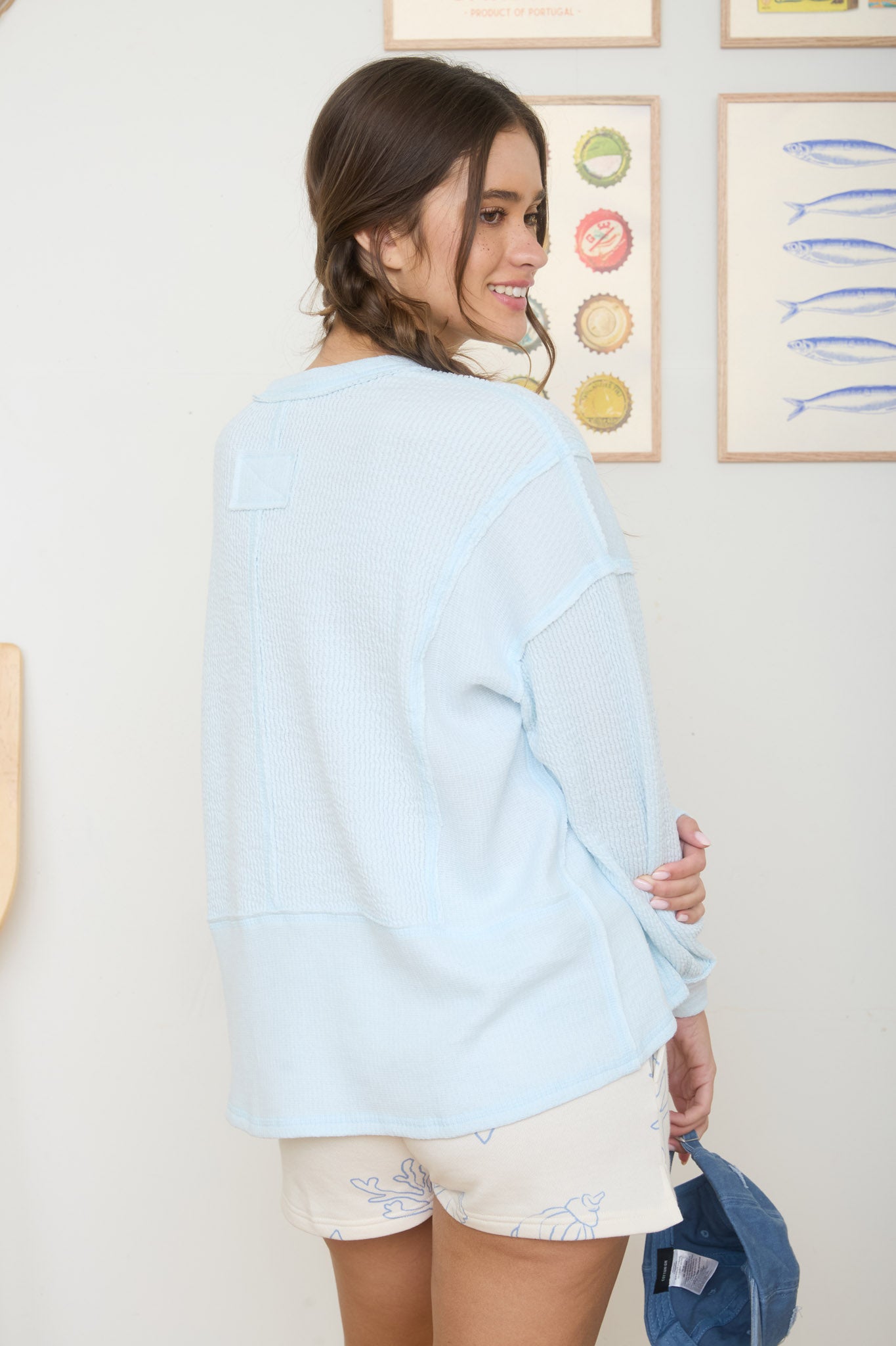 SPLIT NECK RAW EDGE LONG SLEEVE RIBBED KNIT TOP (PRE-ORDER)