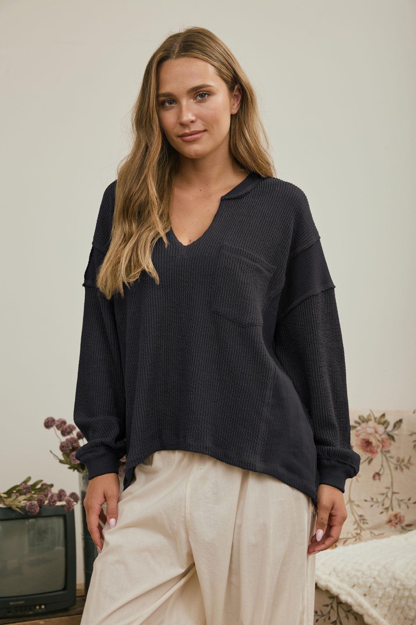 SPLIT NECK RAW EDGE LONG SLEEVE RIBBED KNIT TOP (PRE-ORDER)