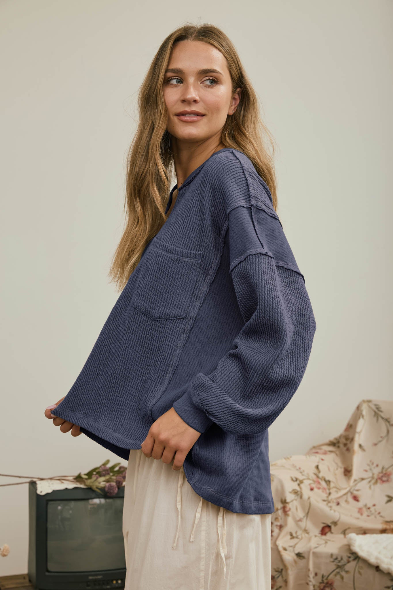 SPLIT NECK RAW EDGE LONG SLEEVE RIBBED KNIT TOP (PRE-ORDER)