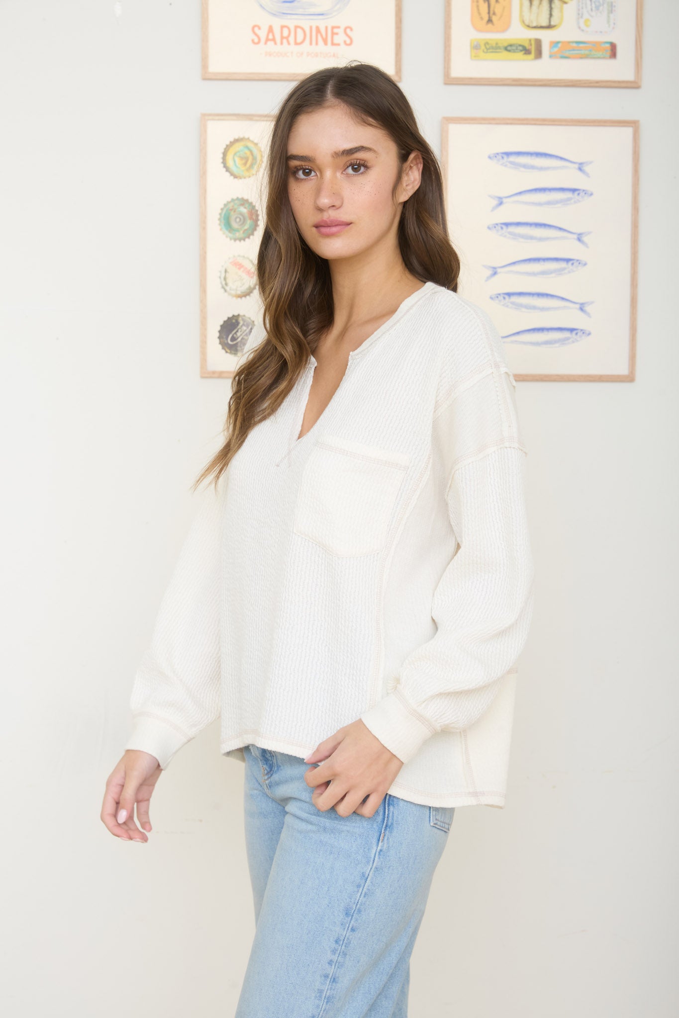 SPLIT NECK RAW EDGE LONG SLEEVE RIBBED KNIT TOP (PRE-ORDER)