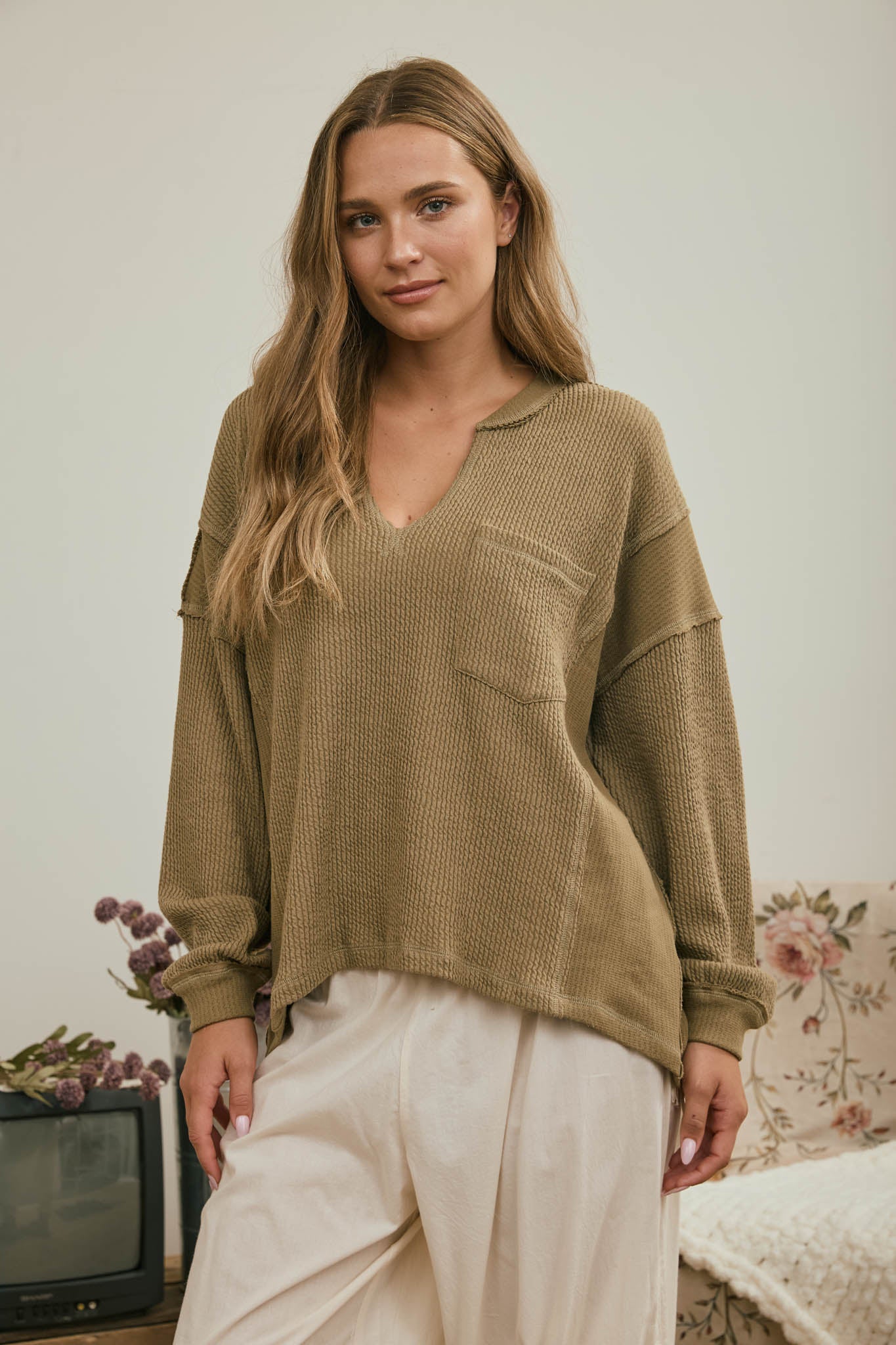 SPLIT NECK RAW EDGE LONG SLEEVE RIBBED KNIT TOP (PRE-ORDER)
