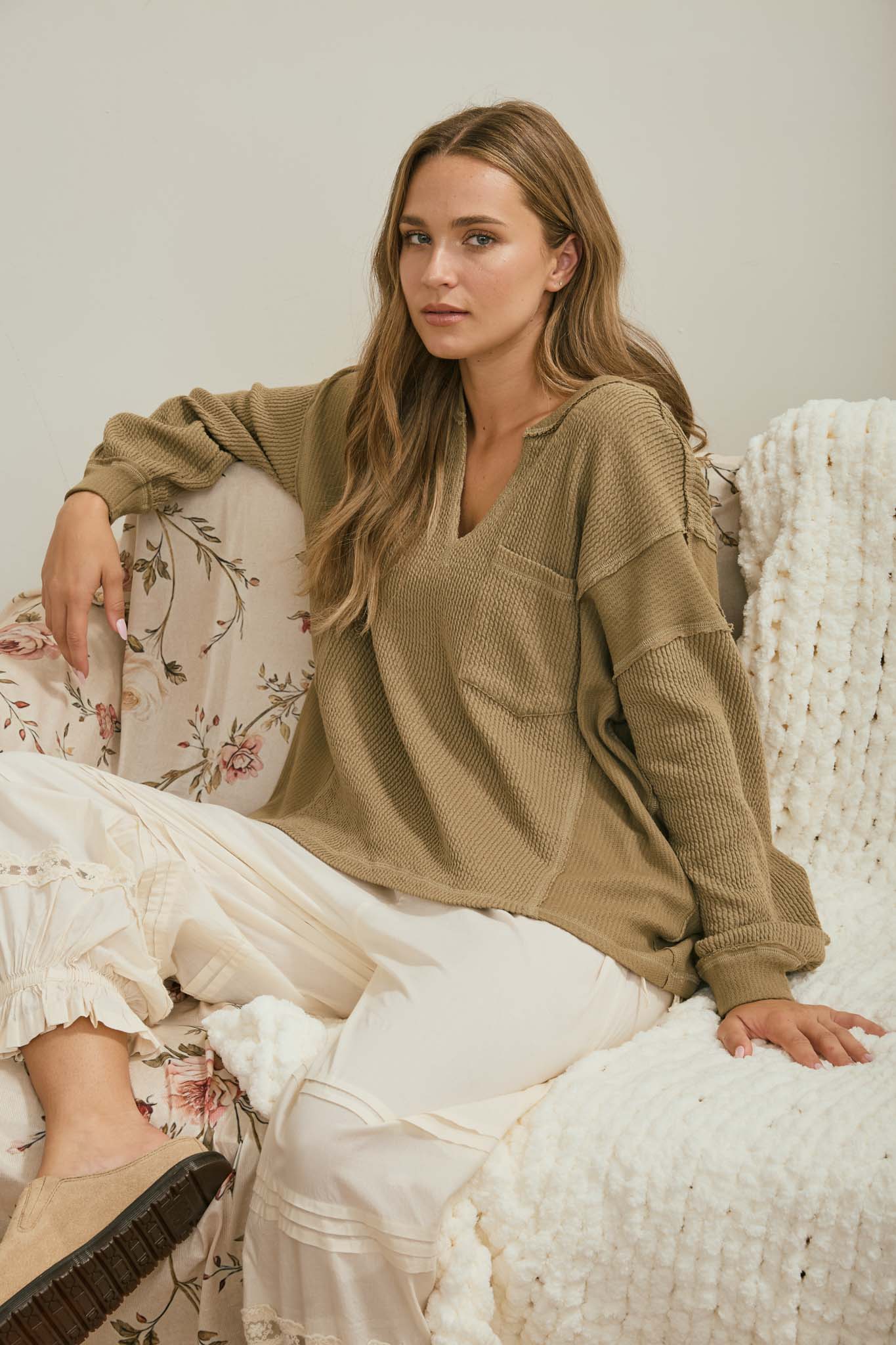 SPLIT NECK RAW EDGE LONG SLEEVE RIBBED KNIT TOP (PRE-ORDER)