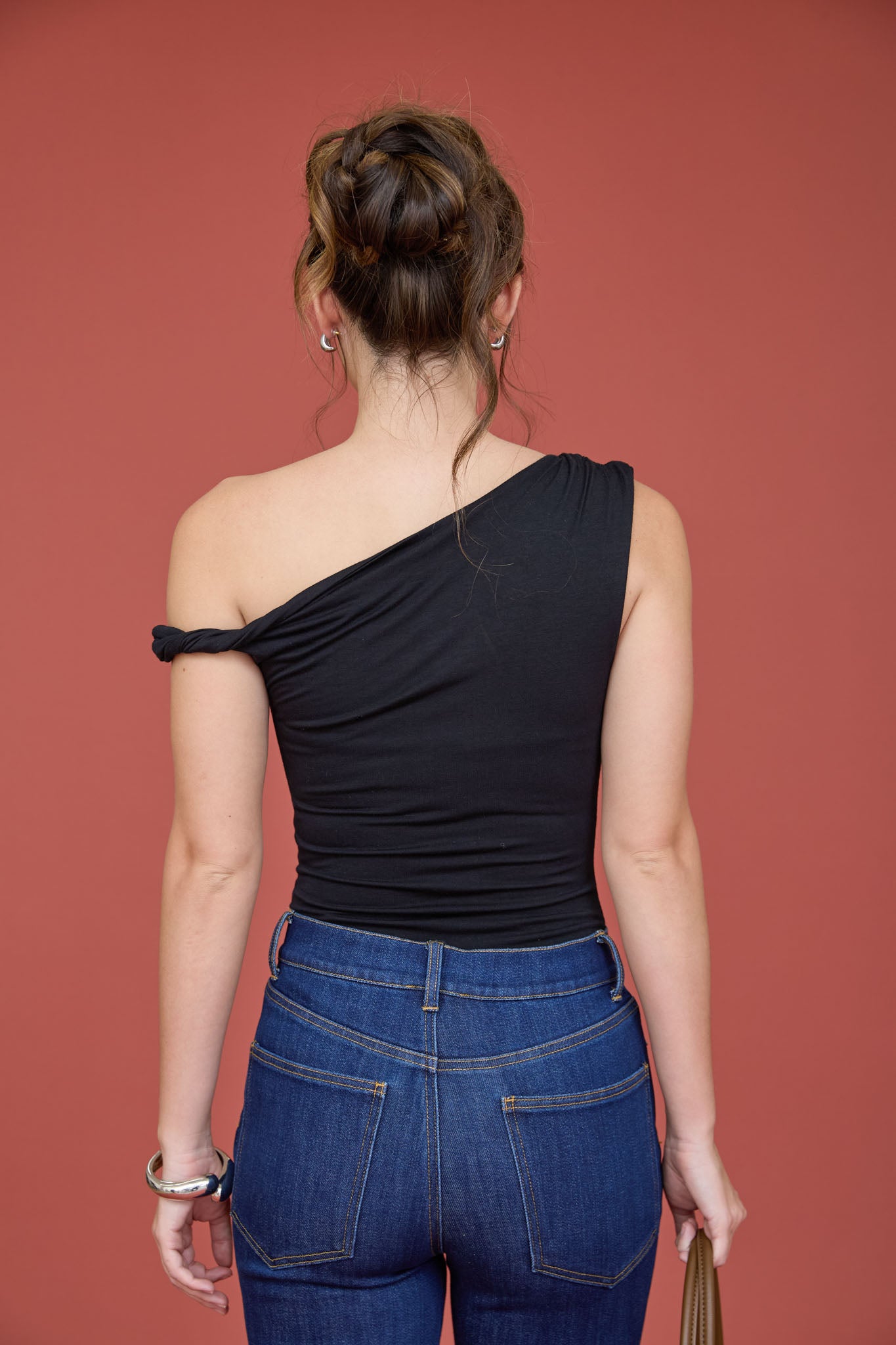 ASYMMETRICAL NECK TWIST SHOULDER KNIT TOP